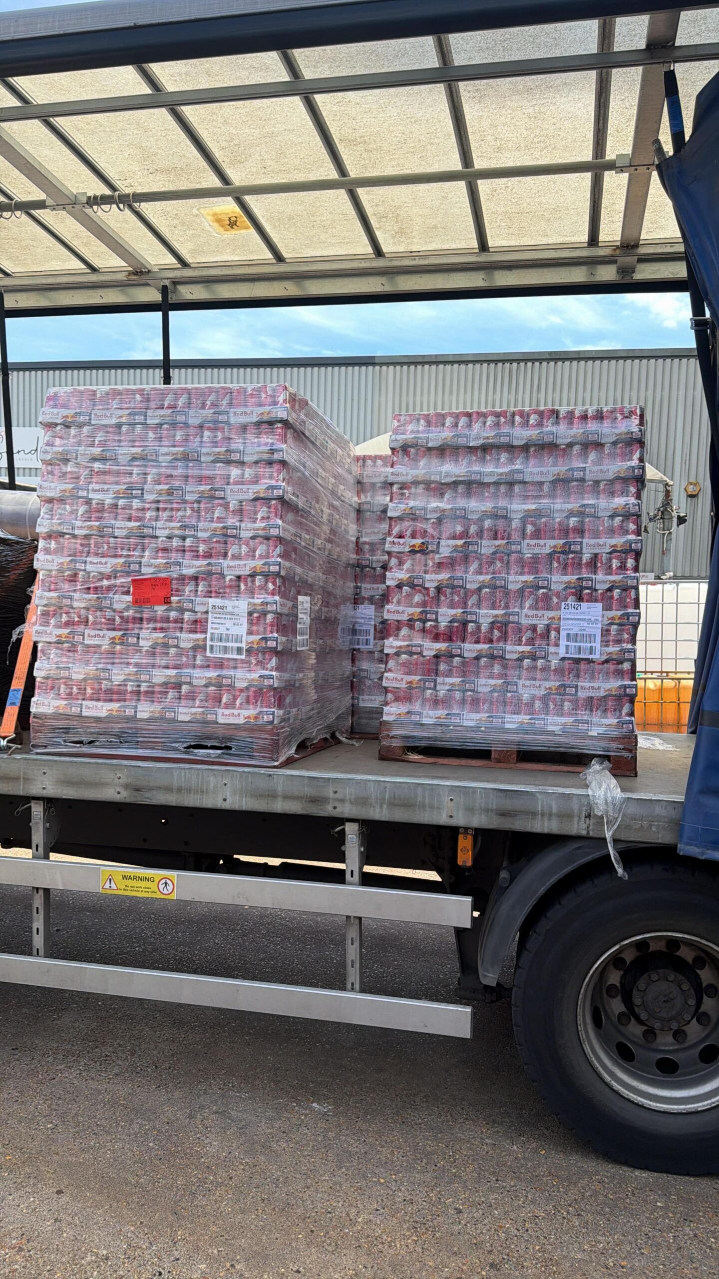 U.S. shipping and delivery: wholesale energy drink pallets stacked and prepared for shipment