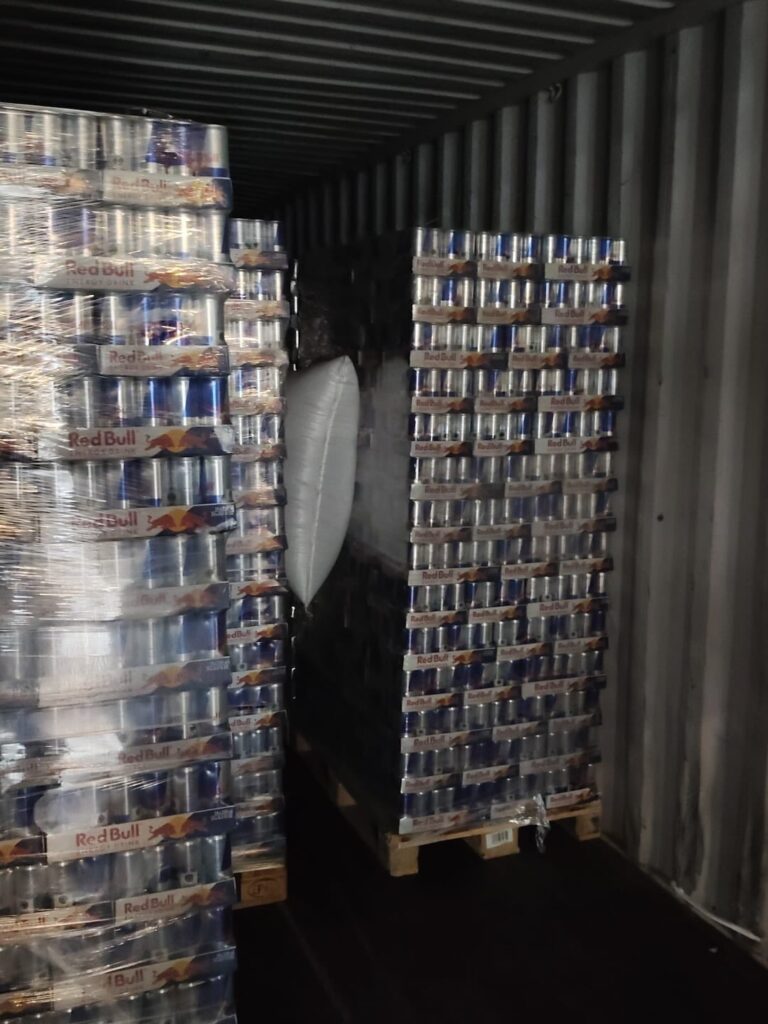 Mixed wholesale energy drink pallets loaded in a 53-foot trailer for a beverage distributor